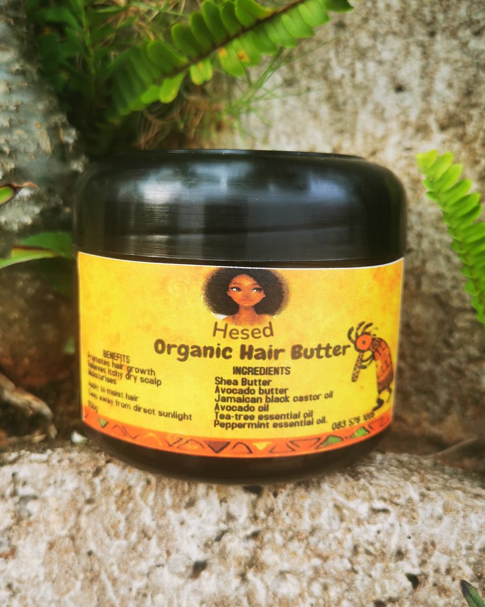 Tub of Organic Hair Butter with a black lid and yellow label